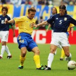 Matias Almeyda of Argentina and  Anders Svensson of Sweden