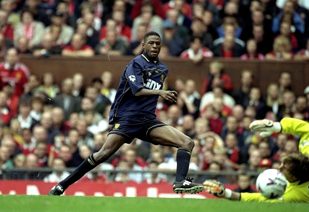 Carl Cort of Wimbledon  Massimo Taibi of Manchester United