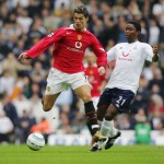 Cristiano Ronaldo of Manchester United and Mbulelo Mabizela of Tottenham Hotspur