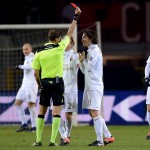 The referee Paolo Tagliavento shows the red card to Alessio