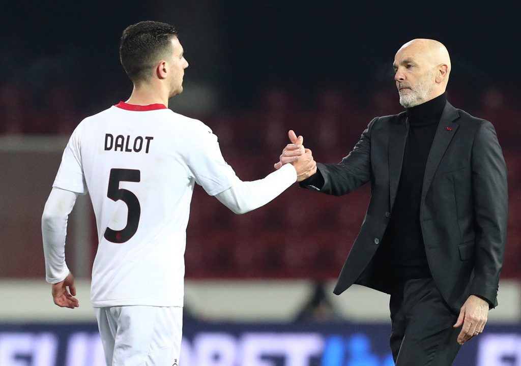 Diogo Dalot e Stefano Pioli
