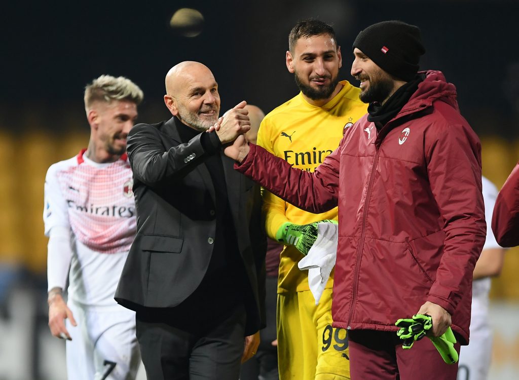 Stefano Pioli, tecnico rossonero, festeggia con Antonio Donnarumma, terzo portiere del Milan